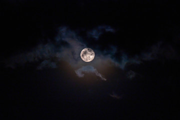 Wall Mural - The moon is blocking the clouds.