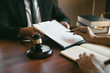 © wutzkoh - Judge is giving advice on client trial laws that have serious consequences for clients.