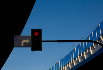 A fragment of a railway overpass in the rays of the sun.