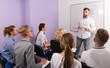© JackF - Group of smiling students at extension courses
