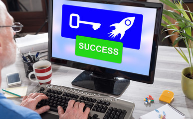 Success concept on a computer