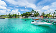 Landscape With Turquoise  Water Amd Speed Boats In Mauritius Island, Africa