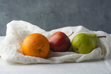 Fruit Still Life. Fresh Fruits On A White Cloth.