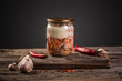farm organic food. Canned meat in a glass jar on a wooden table. banner menu recipe place for text