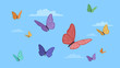 Detailed flat vector illustration of colorful butterflies on a blue background with clouds. International Butterfly Day. Feel free to use only parts of the illustration too.