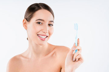 Canvas Print - Beauty portrait of cheerful half naked woman holding toothbrush isolated over white background