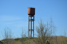 
Old Water Tower Against Clear Sky