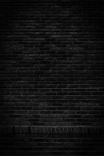 Black Brick Walls That Are Not Plastered Background And Texture. The Texture Of The Brick Is Black. Background Vertical Of Empty Brick Basement Wall.