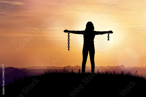 Break free from the chains, Woman with broken chains.