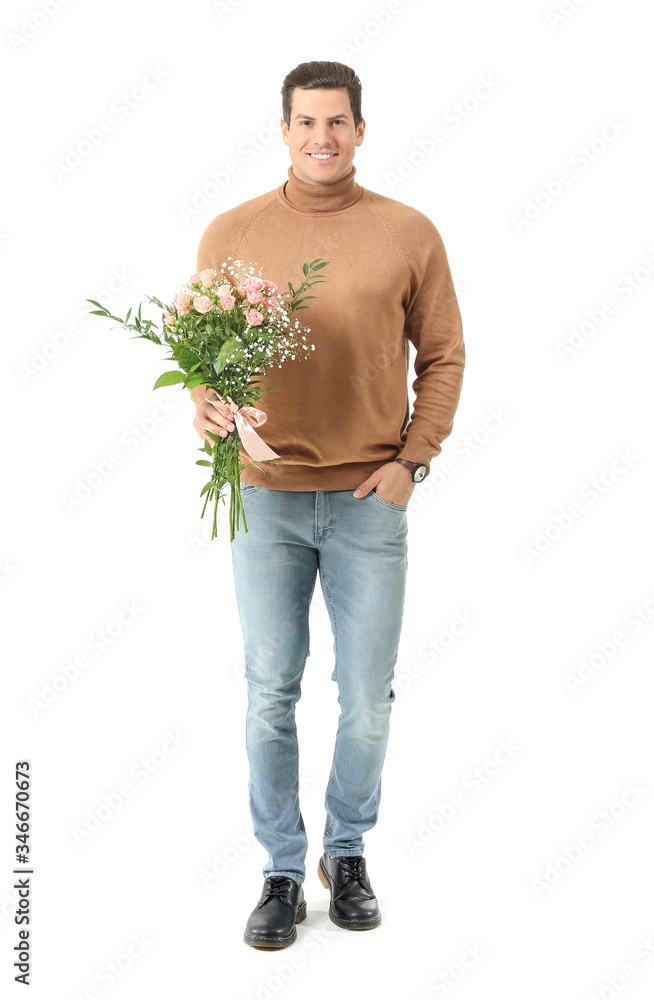 Handsome man with bouquet of flowers on white background