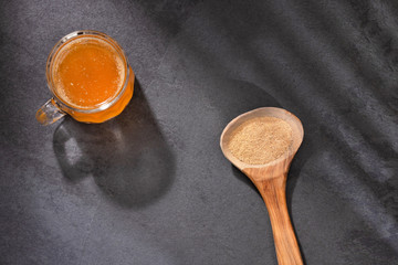 Poster - Maca root health drink in a glass with powdered - Lepidium meyenii.