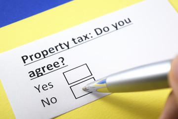 Wall Mural - Property tax: Do you agree? Yes or no?