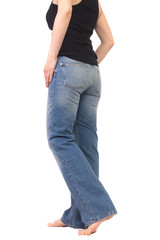 Wall Mural - girl in a black shirt and high waisted jeans isolated on white, body part,