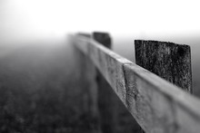 Wooden Fence In Fog