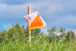 Symbol of orienteering in a clearing