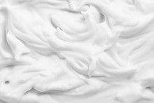 White Cream Foam Texture Background. Cosmetic Mousse, Cleanser, Shaving Foam, Shampoo Lather. Foamy Skin Care Product Close Up.