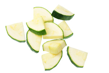 fresh green zucchini slices isolated on white background. top view