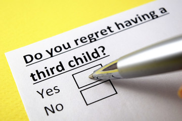 Wall Mural - Do you regret having third child? Yes or no?