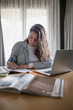 © Laura - Girl studying and working at home