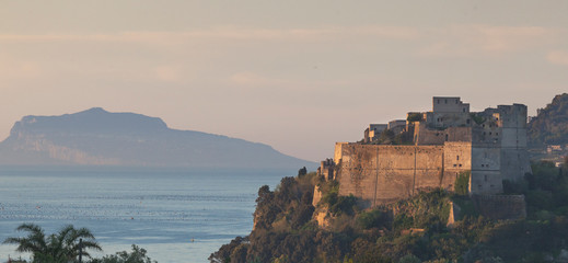 Wall Mural - The Baia Castle near Cape Miseno and island Ischia in the background, Italy