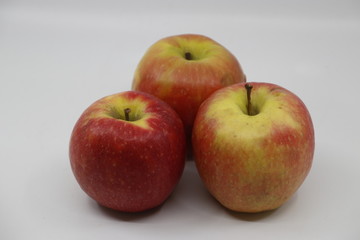 Red apples in white background