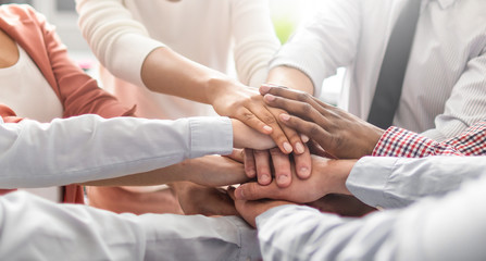 Fototapete - Stack of hands. Unity and teamwork concept.