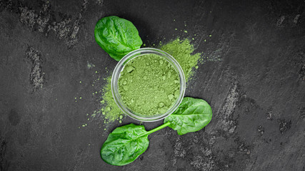 Wall Mural - Freshly made spinach powder (close up; selective focus)