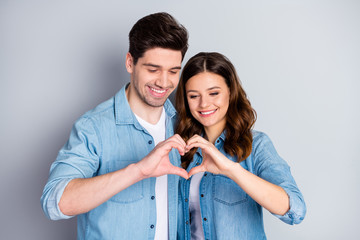 Canvas Print - Photo pretty lady handsome guy couple in love making fingers hands heart figure celebrate first anniversary valentine day wear casual denim shirts outfit isolated grey color background