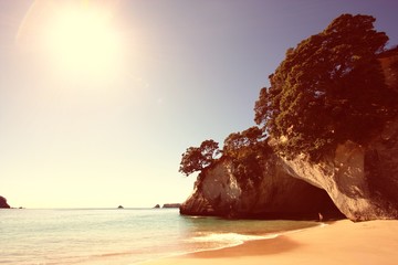 Poster - New Zealand - Cathedral Cove. Vintage filtered colors style.