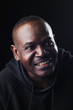 © Andrew - Smiling portrait of a black man.