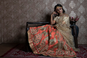 Wall Mural - beautiful indian bride wearing traditional indian bridal dress