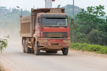 Close-up of a mud truck on a construction site