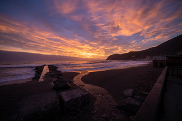 Wall Mural - sunset, sea, jetty, Levanto, italy