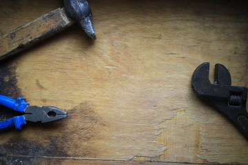 Old tools on a wooden board