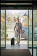 © Westend61 - Businessman entering hotel