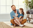 © JenkoAtaman - Father and daughter having fun at home.