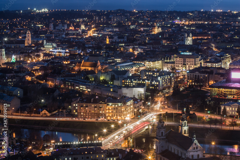 High Angle View Of Illuminated Cityscape At Night - obrazy, fototapety, plakaty 