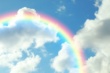 Wall Mural - picturesque view of beautiful rainbow and blue sky on sunny day