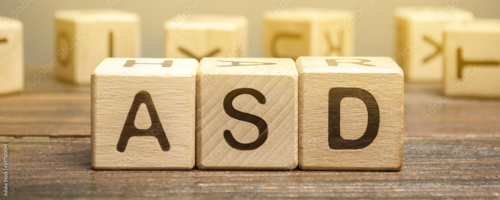 Wooden blocks with the word ASD - Autism Spectrum Disorder ...