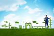 © Elnur - Businessman in green and environmental concept