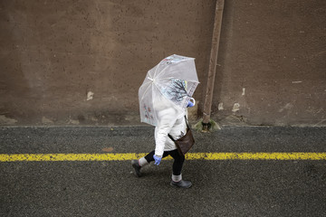 Wall Mural - Person with umbrella