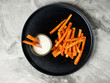 Top view Sweet potato sticks chips appetizer snack served with white sauce. Vegetarian diet and healthy food concept.