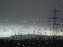 Electricity Pylon Seen Through Wet Window