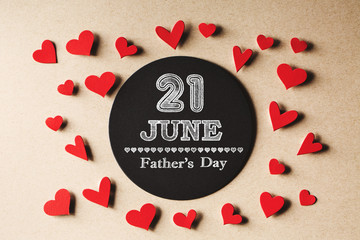 Wall Mural - 21 June Fathers Day message with handmade small paper hearts