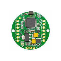 Green round led pulse width modulation dimmer PCB board surface mount components in a close-up top view