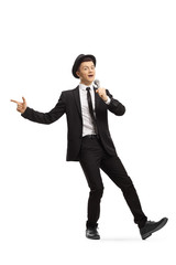 Poster - Young guy in a suit and hat dancing and singing on a microphone