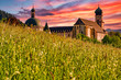 The Benedictine monastery St. Trudpert (Kloster Sankt Trudpert) in the Black Forest in Muenstertal at sunset in front of a colourful sky