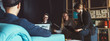 © Alex from the Rock - Business group researching new plan. Team meeting on the couch. Big open space office. Four people. Wide screen, panoramic