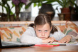 © erika8213 - Study online with video call teacher. Young girl learn online and looking at laptop at home.Social distancing.