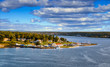 Homes and boats along the shore of Sydney, Nova Scotia, Canada